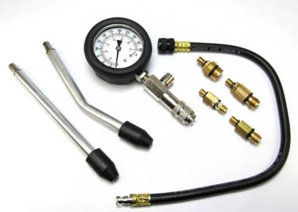 Измерение компрессии в цилиндрах двигателя современном автомобиле